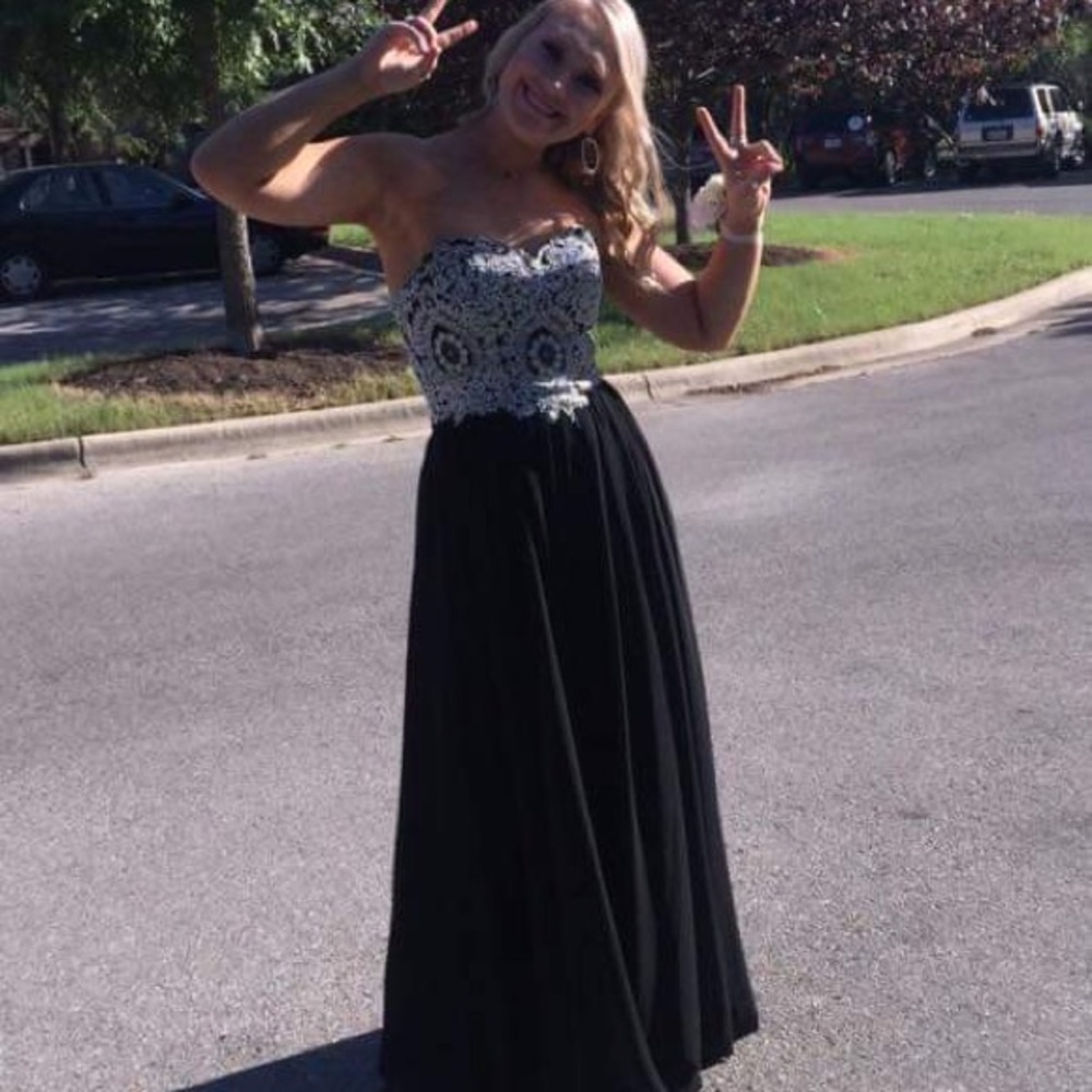 Black sequin top prom dress.